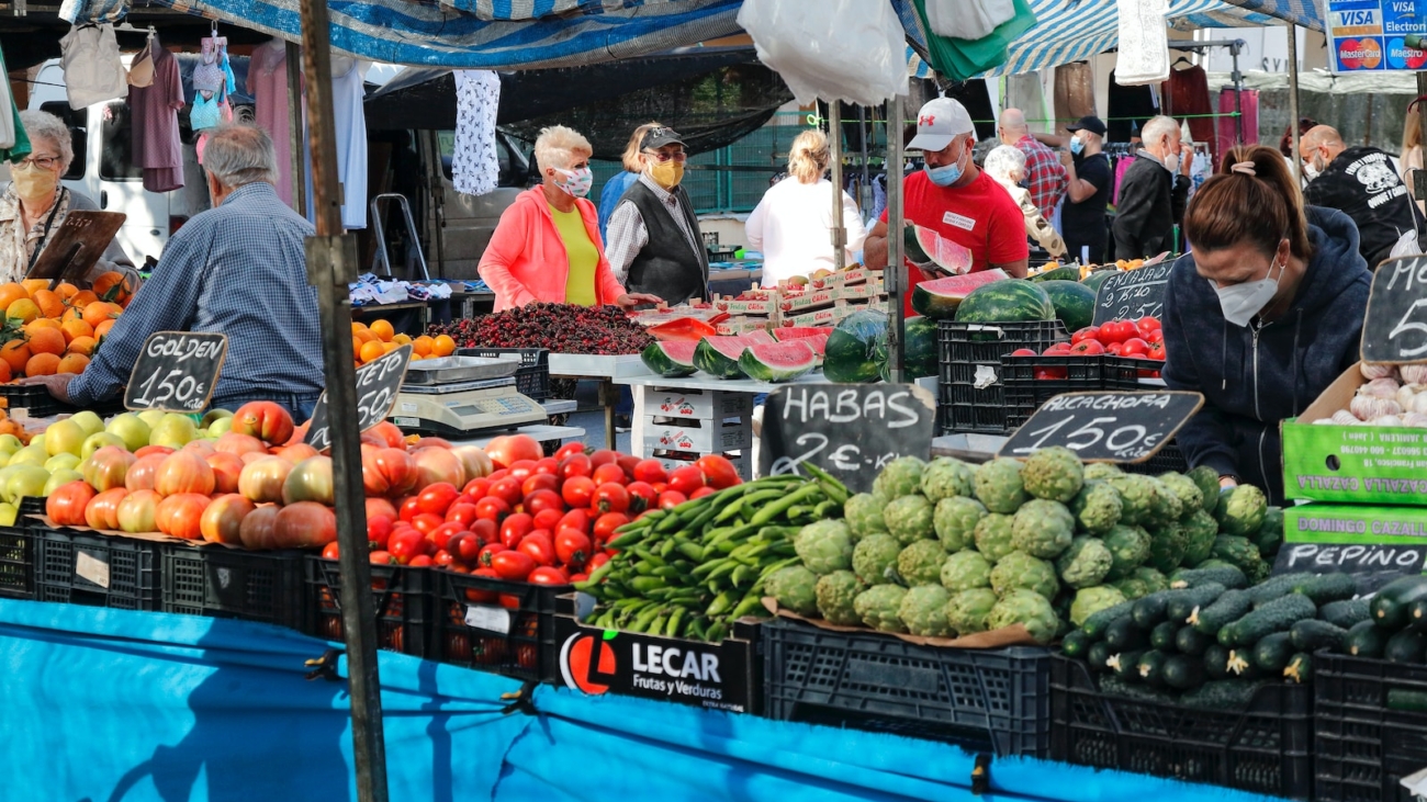 people in market during daytime